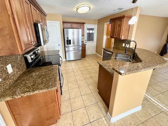 Photo - Now leasing a 4-bedroom 2.5 bath home in Arlington. Great location and great schools!