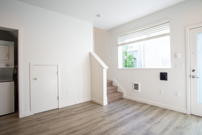 Building Photo - Modern & Sleek One-Bedroom Townhouse Ready... Unit 45-07