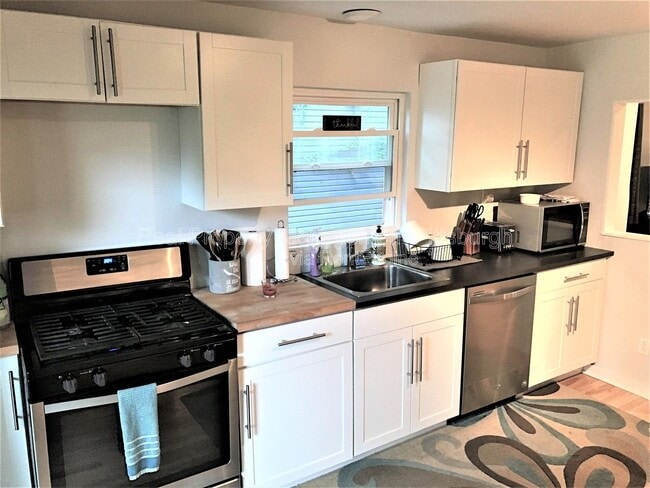 Building Photo - 5619 E Liberty Blvd Unit 1