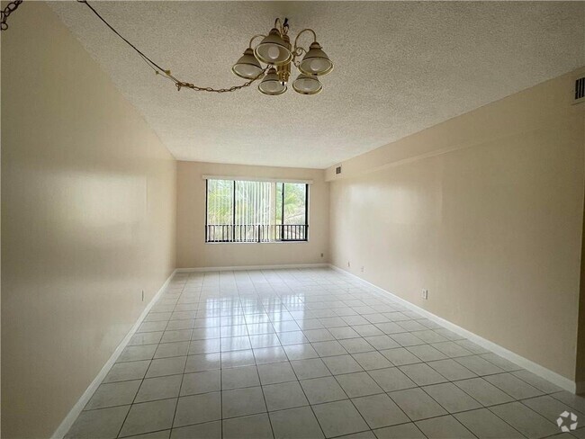 Building Photo - 11477 NW 39th Ct Unit 205 Rental