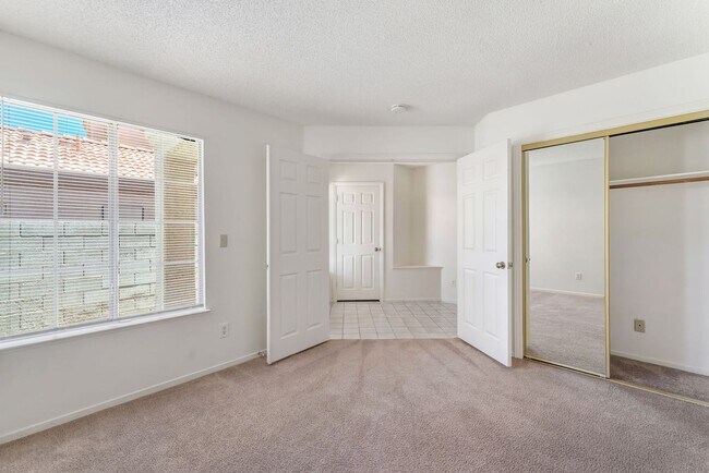 Photo - Vaulted Ceilings, Cozy Fireplace & Desirable Single-Story Living Near The Lakes!