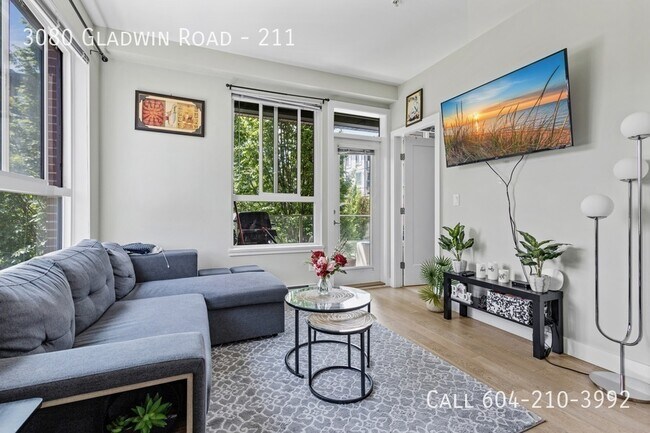 Photo - Bright Corner Condo with 2 Parking Unit 211