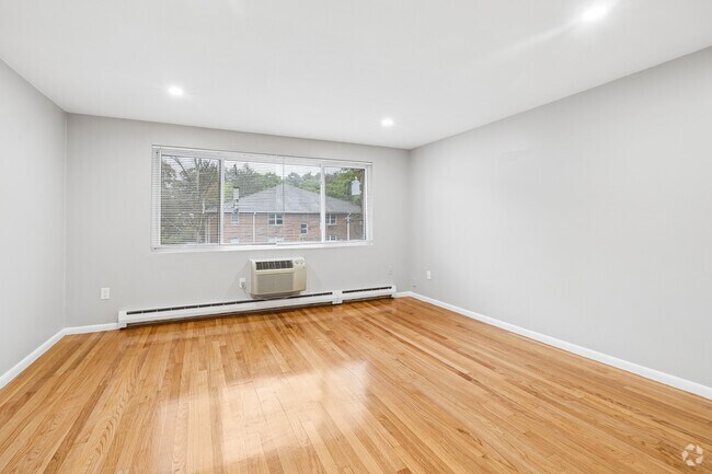 2BR, 1BA - 800SF - Living Room - Iris Court Apartments