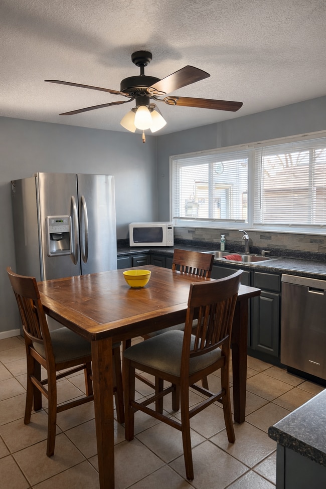 Kitchen with dishwasher and appliances - 513 N Nixon Ave