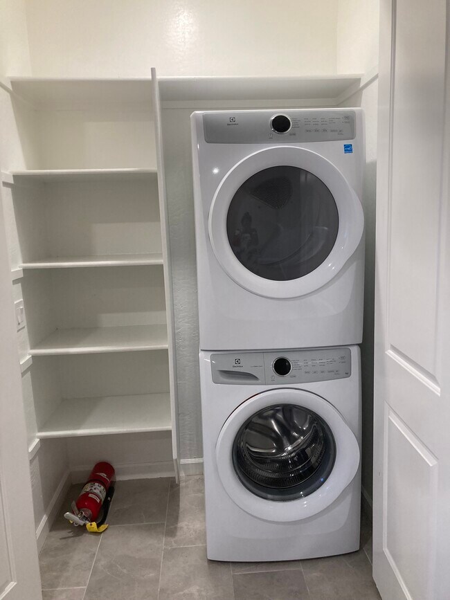 Washer and dryer in the unit with a small pantry - 398 W Pinnacle Ridge Dr Apartment Unit Miriam