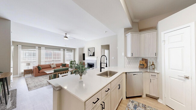 Newly Renovated Kitchen with Quartz Countertops - Lakeside at Coppell Apartments