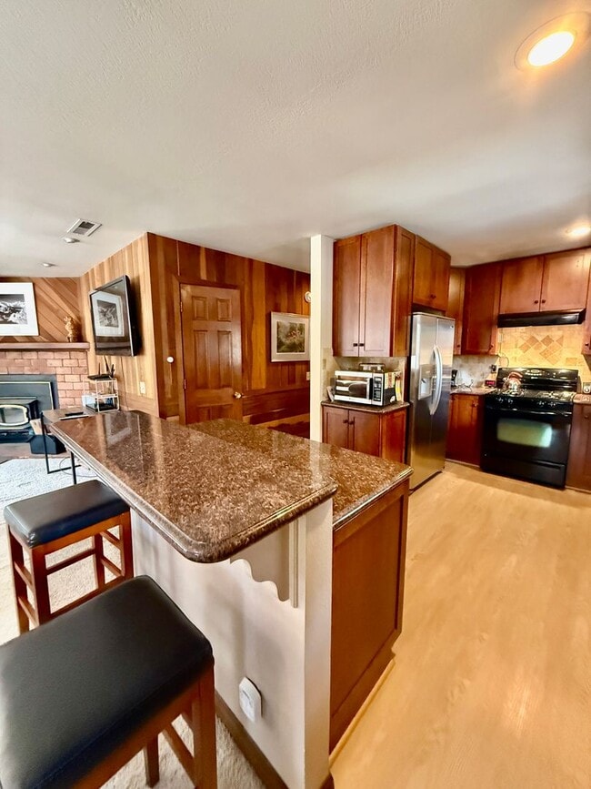 Photo - Furnished 3BD/2BA Near Eagle Lodge | Sunny Deck | Wood-Burning Fireplace | Garage