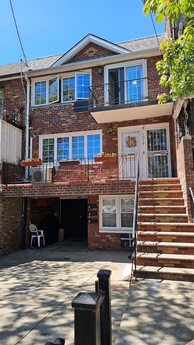 Building Photo - 1018 E 85th St Unit 2