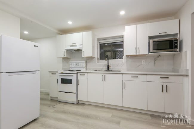 Photo - Rare 2 Bedroom Suite  in Great  Sardis Loc... Unit Basement