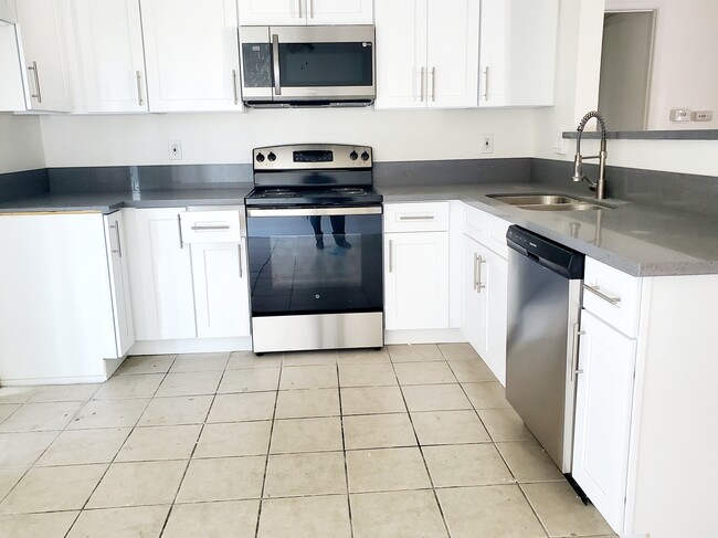 Newly remodeled kitchen - 3455 Elm Ave Apartments Unit #312