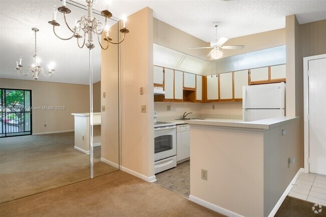 Building Photo - 10869 W Clairmont Cir Unit 209 Rental