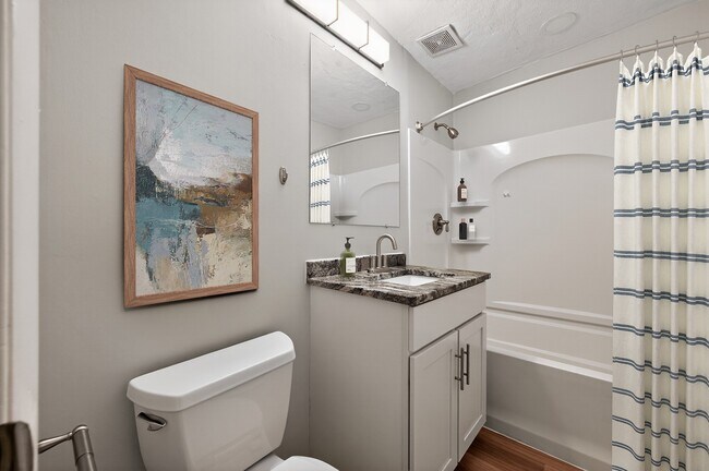 Elevate your living experience at Park Village West with this stylish bathroom featuring modern fixtures and serene decor. Enjoy the perfect blend of comfort and functionality. Schedule a tour today to see it in person!