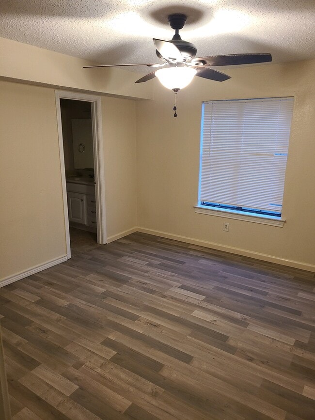 Photos of sample unit with identical layout - Masterbedroom with attached masterbathroom - 201 W Trinity St Unit B