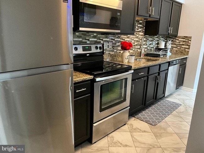 Building Photo - 3708 Excalibur Ct Unit 304