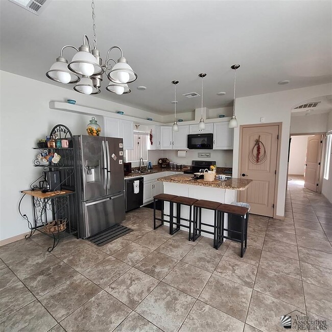 Photo - 12726 E 47th Dr