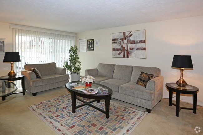 Sala de estar - Camelot Court Apartments