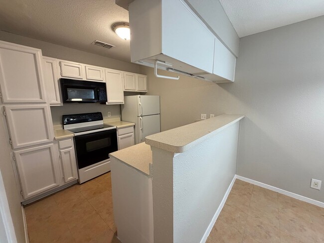 Photo - NICE 1 BR CONDO IN DESIRED GATED COMMUNITY*EASY ACCESS TO I35, 410, AND SHOPPING*APPLIANCES INCLU...