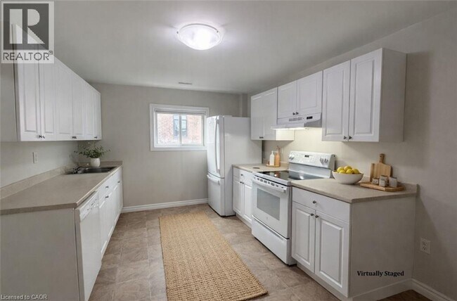 Photo - 3 King St E Unité Apt