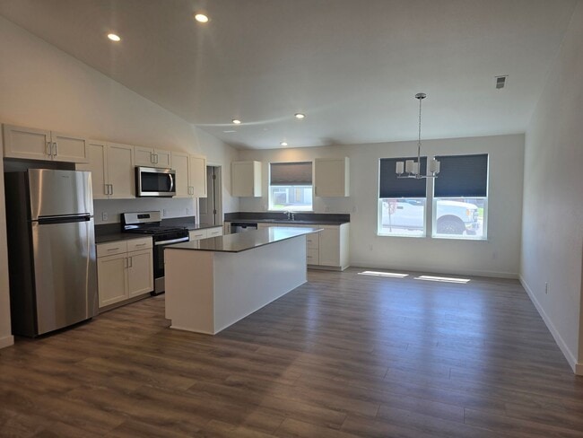 Building Photo - Beautiful, light-filled 3-bedroom, 2-bath home with an open-concept design and attached 2-car gar...