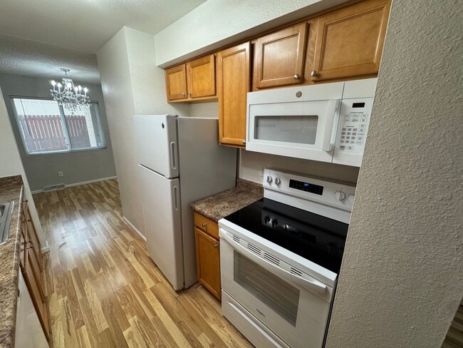 Photo - Move-In Ready 2 Bed Townhome | New Carpet | 2 Parking Spaces