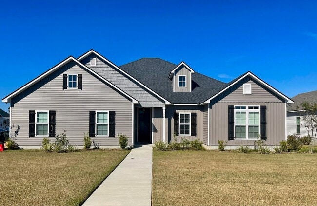 Photo - Elegant 4-Bedroom Home with Modern Upgrades, Fenced Yard, and Outdoor Living