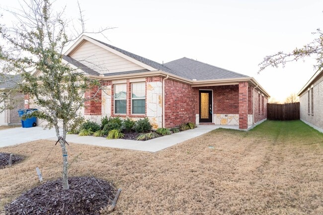 Photo - Located in the Trails at Riverstone community, this inviting 5-bedroom, 2-bathroom home offers a ...