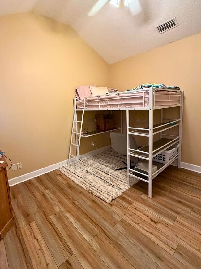 Photo - 3/2 with grass cutting included & access to community amenities.