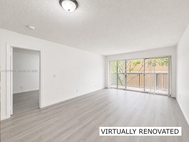 Photo - 8761 Wiles Rd Unit 206