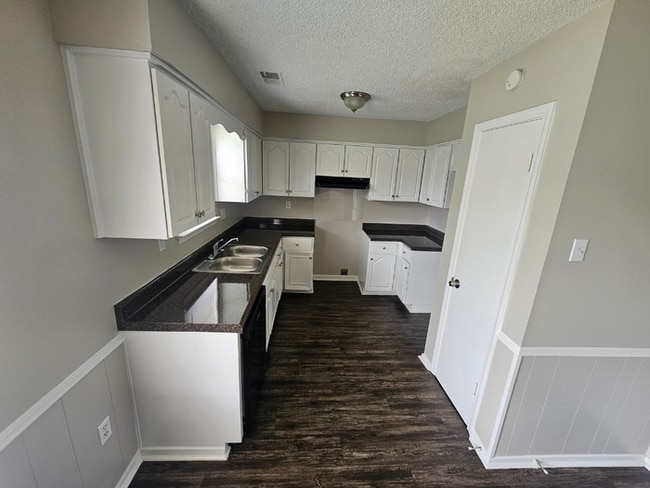 Photo - PREMIUM RENTAL! 3BR/2BA | Stone Fireplace & Hardwoods | Fenced Yard!