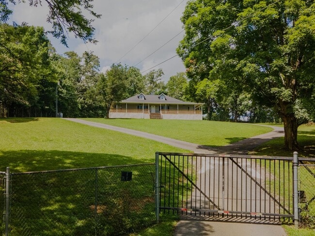 Photo - SHORT TERM - Spacious 3-Bedroom home with Wrap-Around Porch