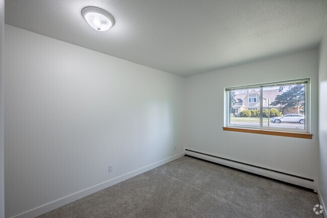 2BR, 1BA - 870SF - Second Bedroom - Falls Apartments