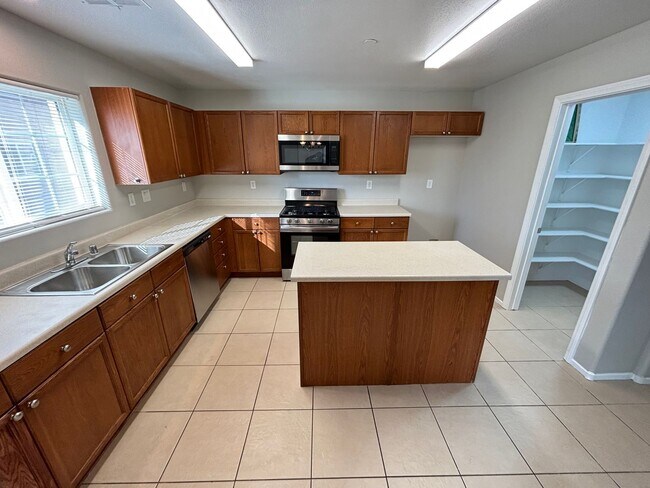 Photo - Spacious Tri-Level 4-Bedroom Home with Bal...