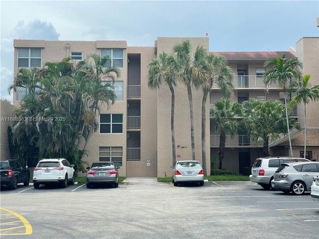 Building Photo - 9400 Live Oak Pl Unit 306