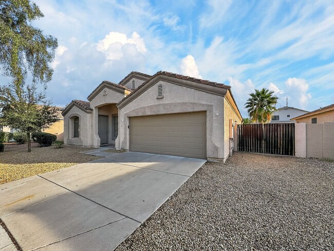 Photo - Single-level 4 bed, 2 bath home with tandem 3-car garage and RV gate.