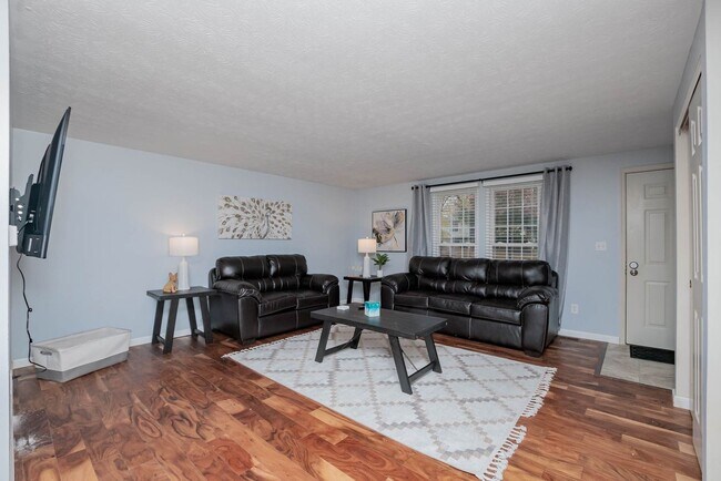 Photo - Inviting home with private fenced yard for pets