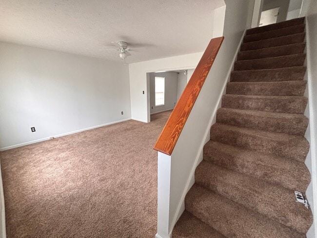 Photo - Spacious 4 Bedroom 2.5 Bath Single Family Home. Large Fenced in Yard. Front Porch. Garage.