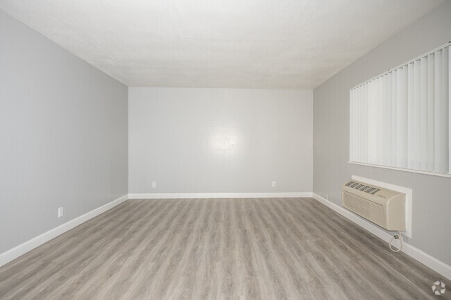 2BR, 1BA - 750SF - Living Room - Pacific Garden Apartments