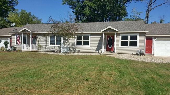 Building Photo - Spacious 3BR Duplex with Finished Basement & 2-Car Garage in Otsego Unit 1387