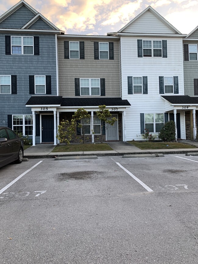 Front of Property - Two Assigned Parking Spots - 307 Caldwell Loop Townhome