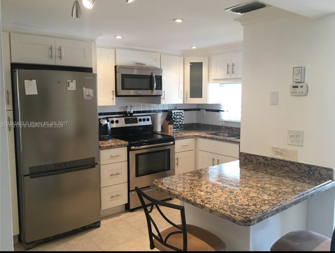 Photo - 5460 W 21st Ct Condo Unit 206
