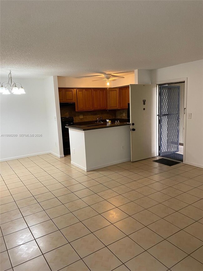 Building Photo - 9608 W McNab Rd Unit 103