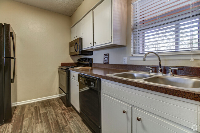 Kitchen with Microwave * select units - Oak Terrace Rental