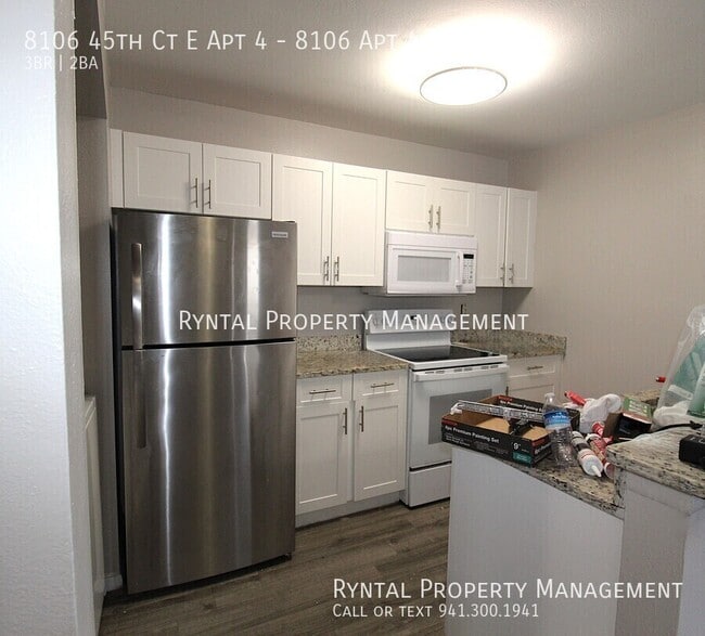 Building Photo - 8106 45th Ct E Unit 8106 Apt 4
