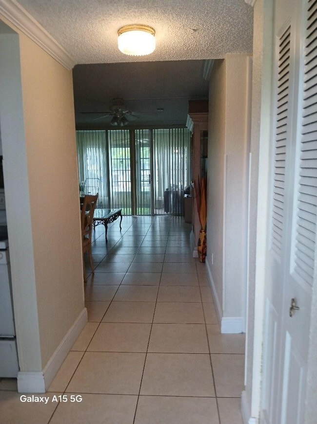 Building Photo - 6021 NW 61st Ave Unit 209