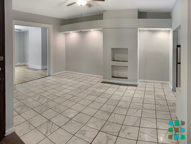 Living/Dining area with opened bedroom pocket doors - 131 Hall Street Unit Apt1