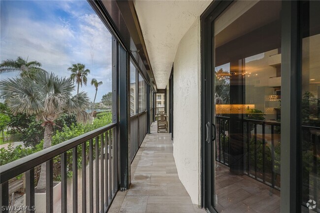 Building Photo - 9653 Gulf Shore Dr Unit 203 Rental