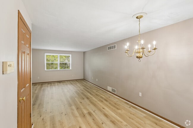 2BR, 1BA - 1,050SF - Living Room - Cabin Hill Place