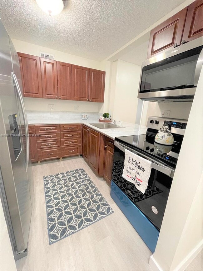 Photo - 15969 NW 64th Ave Condo Unit 202