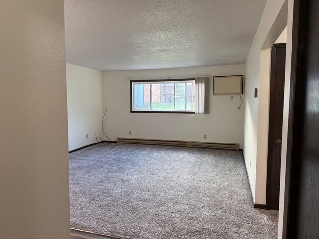 Photo - Spacious 2-Bed, 1-Bath Apartment Just 15 Minutes from Fargo Unit 2