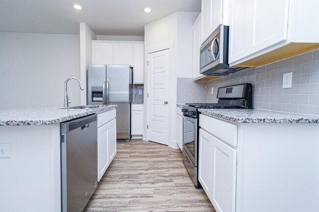 Photo - 303 Windsinger Ln